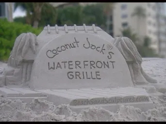 coconut jacks logo made out of sand